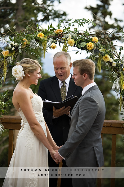 colorado mountain wedding ceremony floral arch