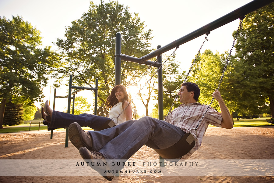 denver colorado city park engagement portrait session playground swings