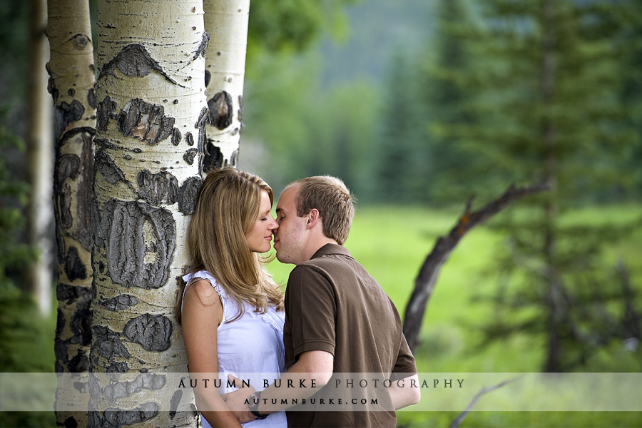 evergreen colorado engagement portrait session with aspen trees