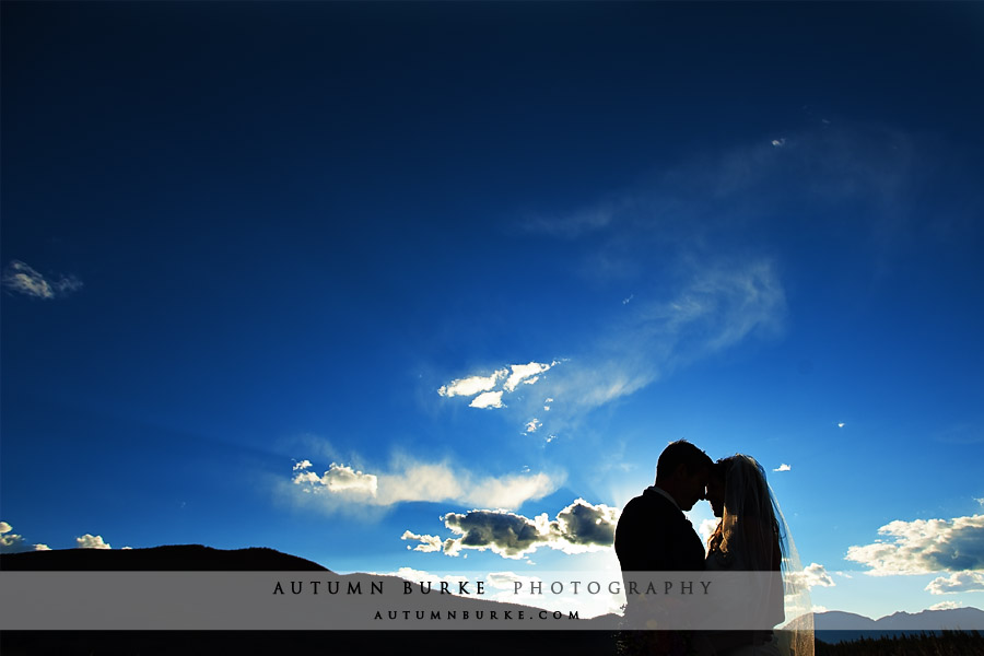 colorado bluebird sky bride groom silhouette keystone mountain wedding