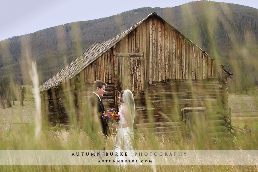 keystone ranch mountain wedding old cabins bride groom first look