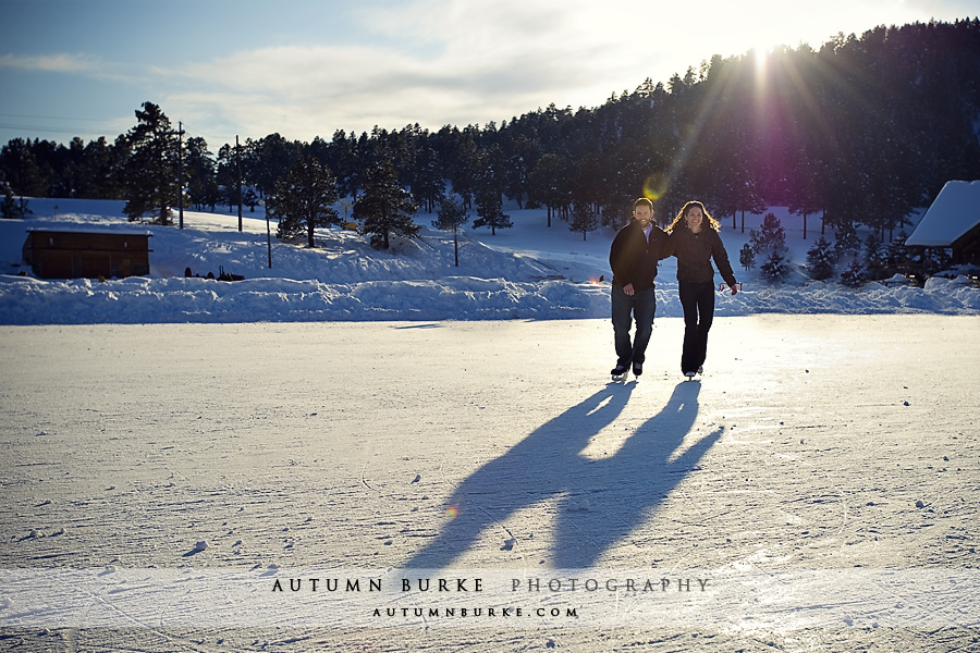 evergreen lake colorado ice skating engagement portrait session