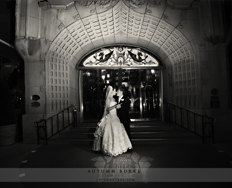 front entrance to the historic brown palace hotel denver wedding bride and groom