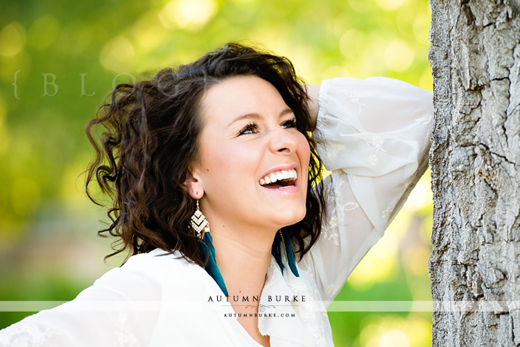 colorado senior portrait session girl laughing 