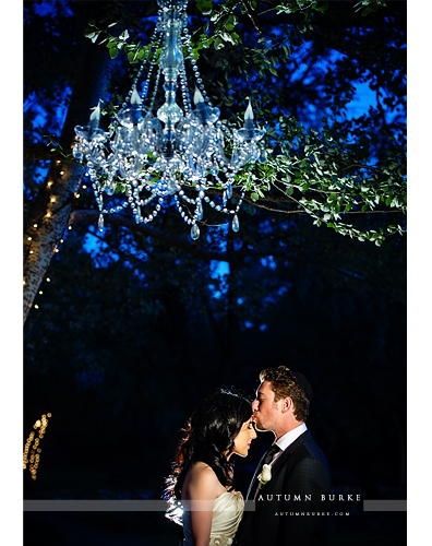 denver colorado lionsgate event center wedding bride and groom outdoor chandelier