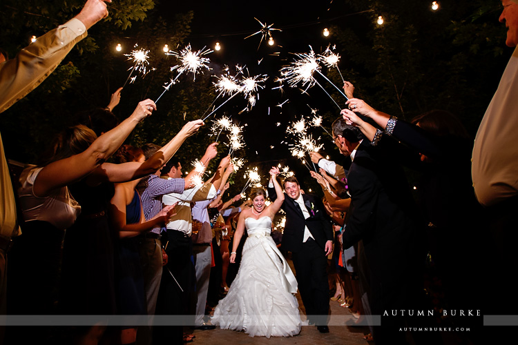 crooked willow farms wedding larkspur colorado sparkler exit bride and groom