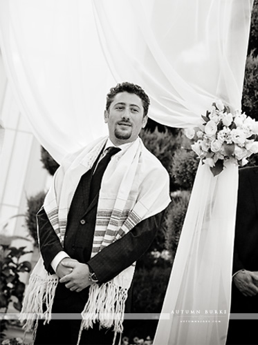 groom waits for bride under the chuppah at lionsgate event center colorado wedding