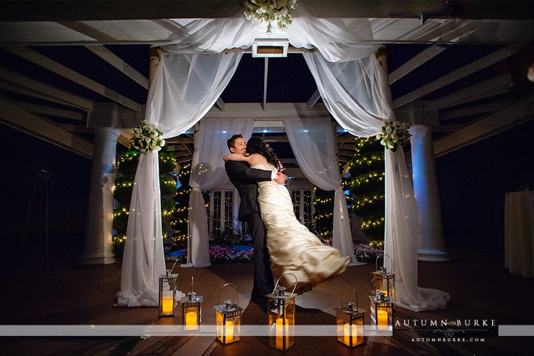 colorado bride and groom lionsgate wedding night portrait under chuppah with lanterns