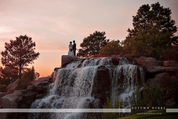 the sanctuary sedalia colorado golf course wedding waterfall sunset bride and groom