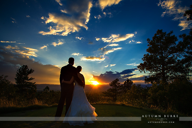 the sanctuary sedalia colorado incredible sunset with bride and groom