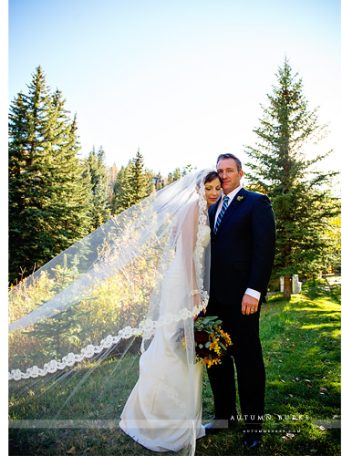 sonnenalp vail wedding colorado bride and groom portrait cathedral veil