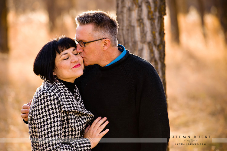 denver wedding engagement portrait couple kissing sweet