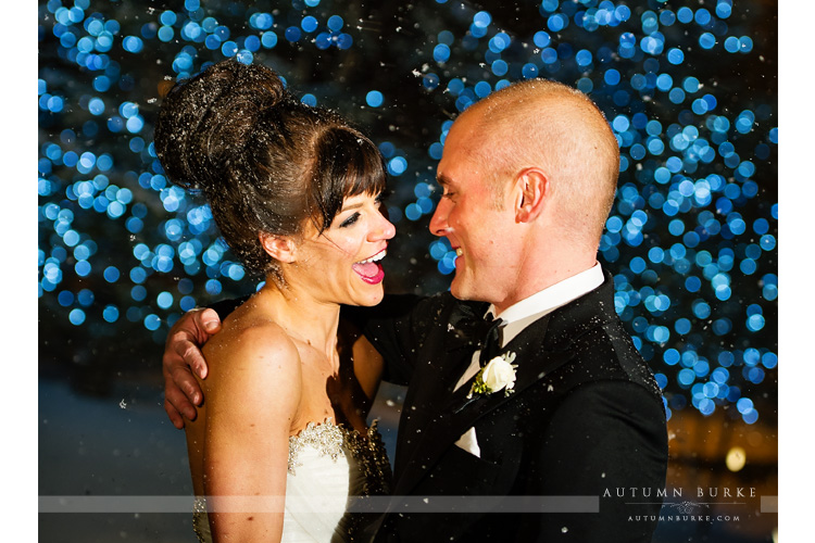 four seasons vail colorado winter wedding bride and groom laughter snow