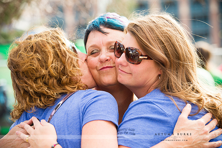 event photography group hug st baldricks fundraiser