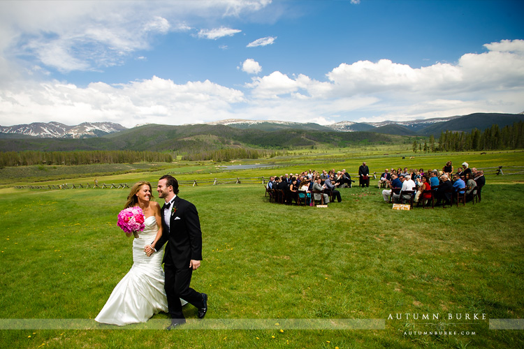 bride and groom exit wedding ceremony devils thumb ranch colorado mountains