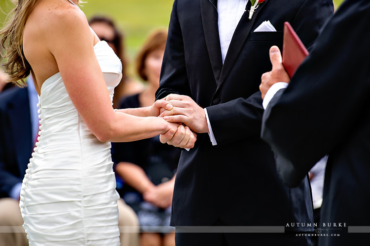 devils thumb ranch colorado wedding ceremony hands entwined