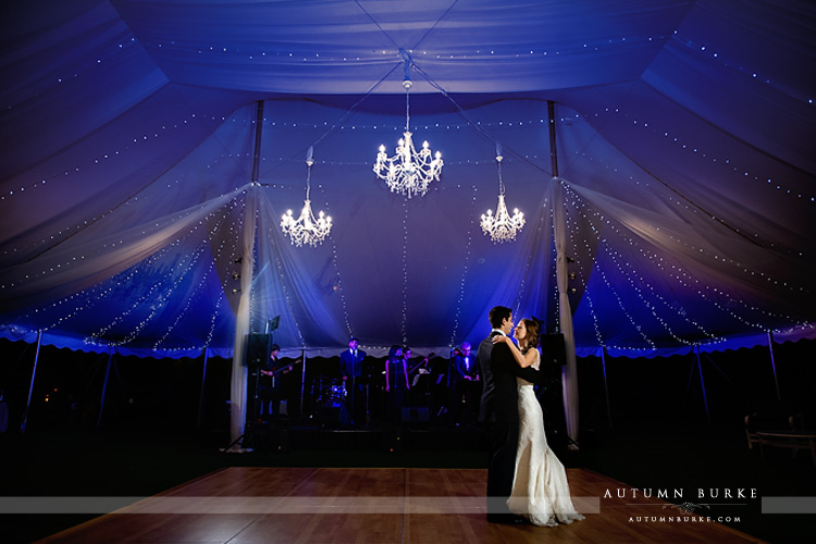 denver country club wedding first dance tent with chandeliers 