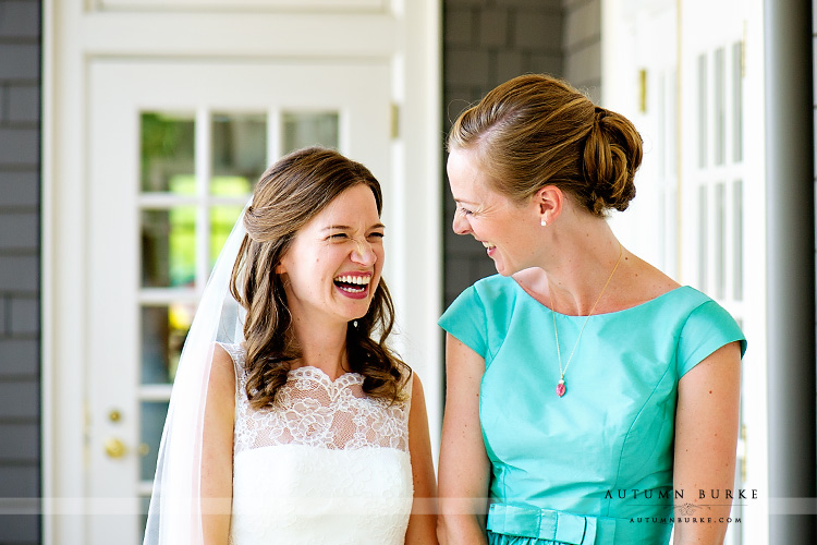 denver country club colorado wedding bride portrait with sister laughter joy emotion