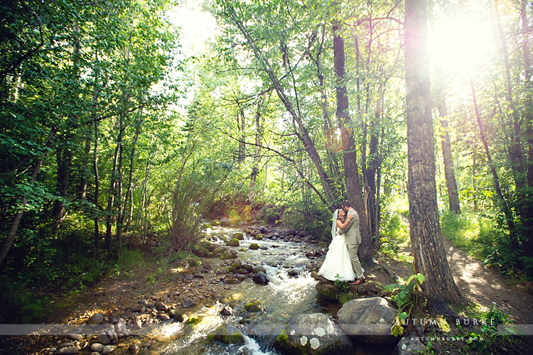 beaver creek allies cabin wedding chapel ceremony bride and groom by river