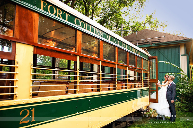 inn at fort collins wedding avo's bride and groom trolley portrait