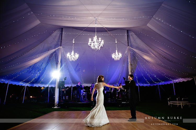 tent with chandeliers first dance at denver country club wedding colorado