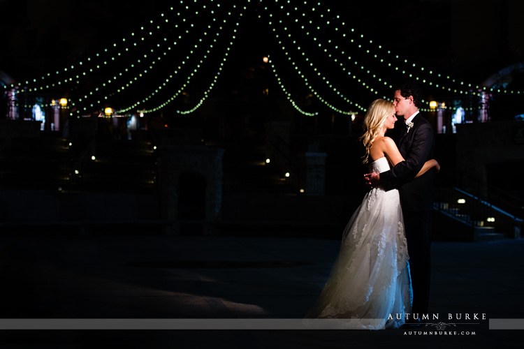 colorado mountain wedding vail arrabelle courtyard night lights bride and groom 