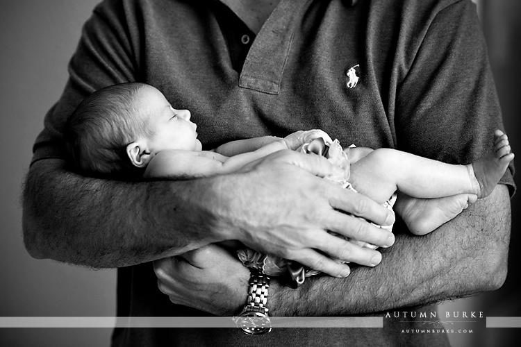 denver family portrait newborn baby cradled in daddy's arms colorado