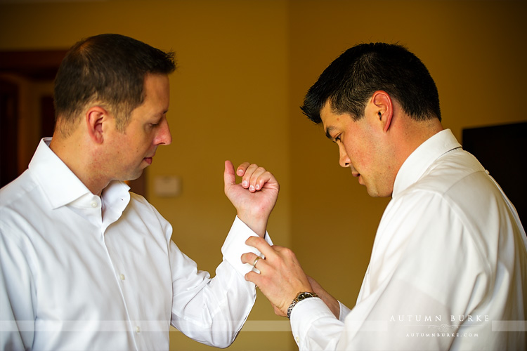 groom prep with best man cufflinks getting ready four seasons vail