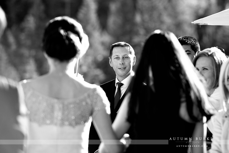 four seasons vail wedding ceremony colorado groom sees bride