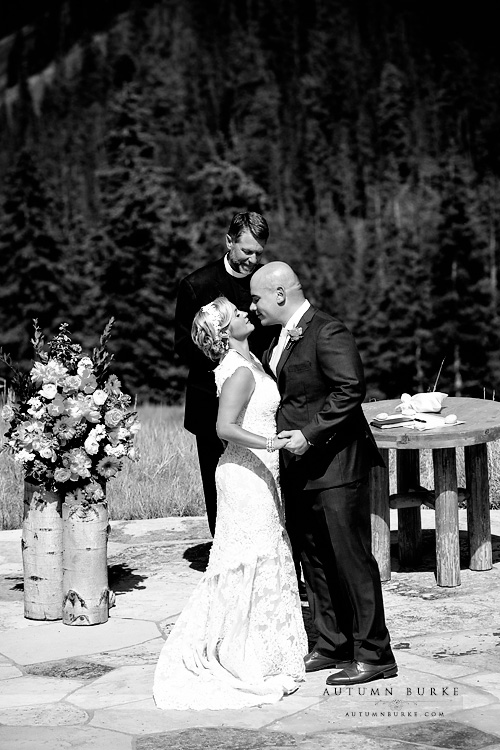 beautiful colorado mountain wedding beaver creek wedding deck ceremony kiss