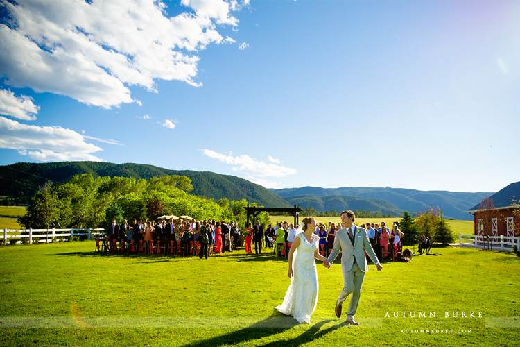 colorado wedding ceremony crooked willow farms barn just married bride and groom