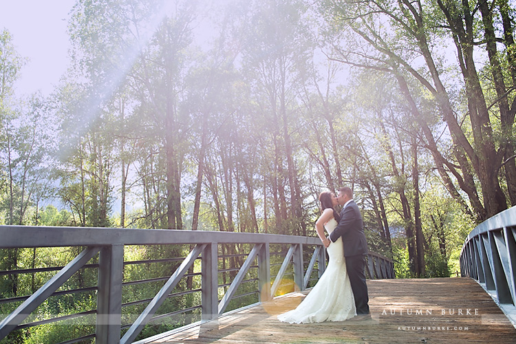 aspen colorado mountain wedding deck little nell first look bride and groom on bridge