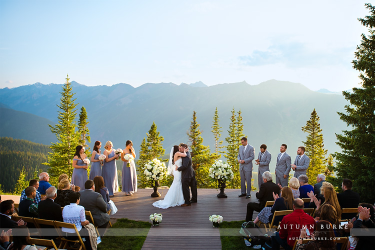 aspen wedding deck ceremony colorado mountain wedding bride and groom just married wedding little nell