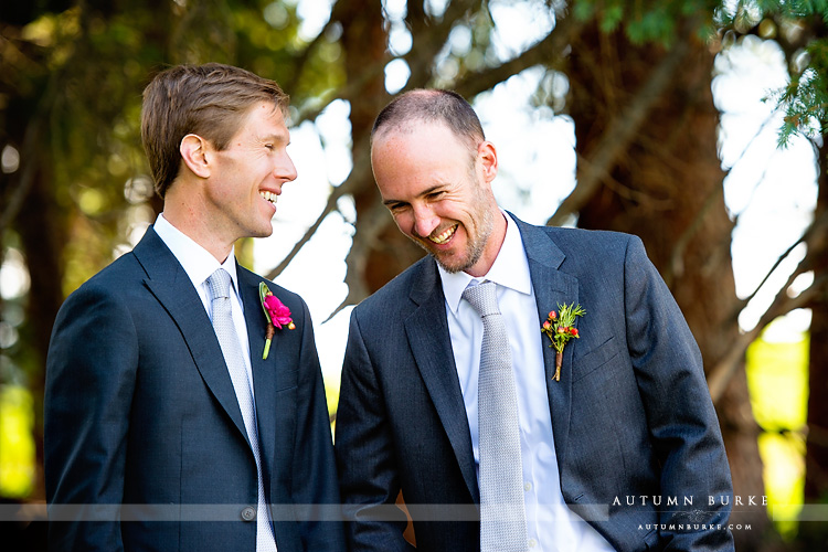 beaver creek saddle ridge wedding colorado mountain wedding deck groom and best man laughing