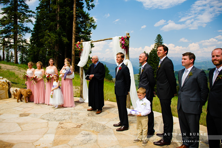 beaver creek wedding deck colorado mountain ceremony groom watches bride walk down aisle