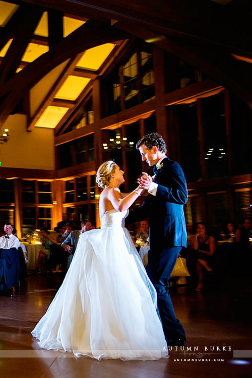 bride and groom first dance vail wedding reception donovan pavilion colorado mountain wedding vertical