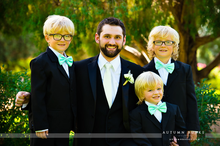 colorado highlands ranch mansion wedding groom with ring bearers