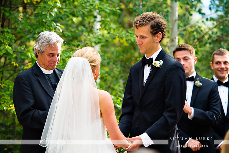 groom during wedding ceremony vows donovan pavilion vail colorado mountain