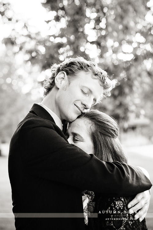 sweet embrace between groom and his mom colorado vail wedding bw