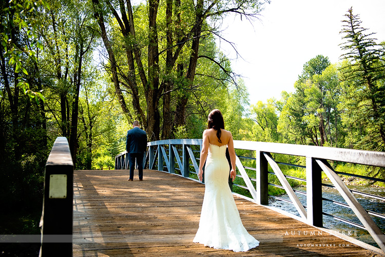 the first look bride and groom on bridge aspen colorado mountain wedding