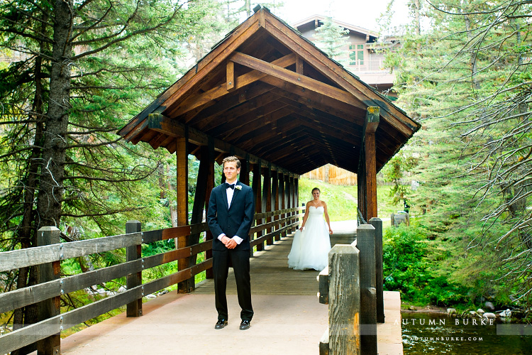 vail colorado mountain wedding bride and groom first look on bridge donovan pavilion