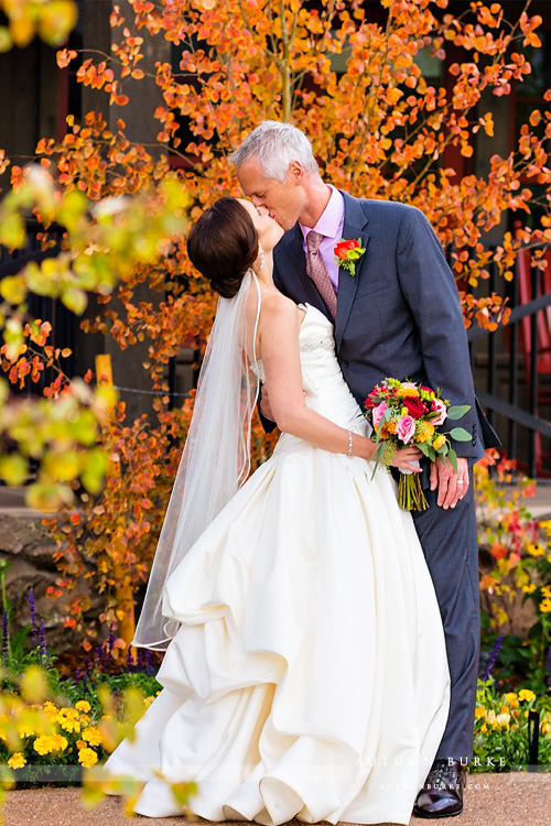 fall trees devils thumb ranch wedding bride and groom