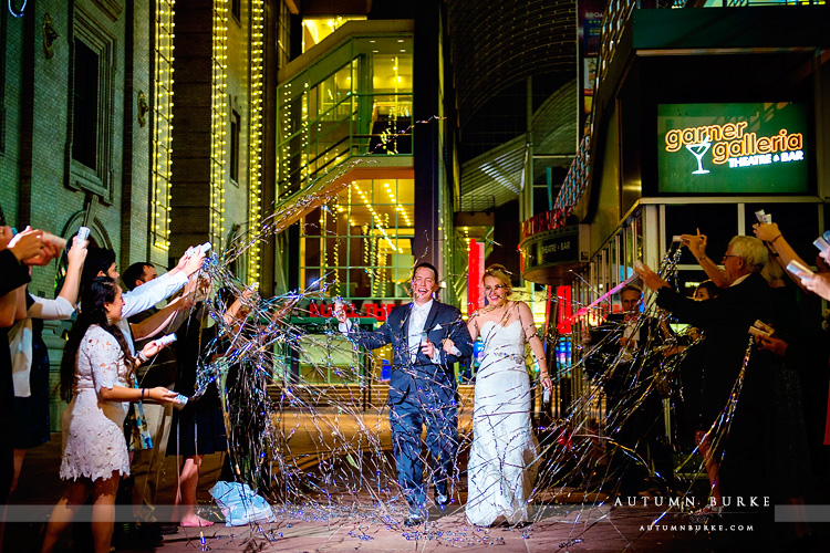 wedding reception grand exit seawell ballroom dcpa denver colorado silver confetti streamers