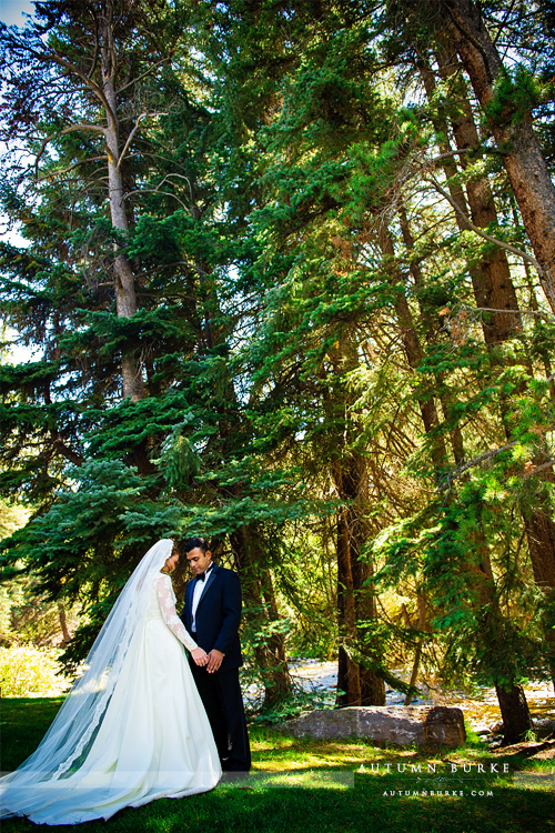 bride and groom first look vail chapel colorado mountain wedding four seasons