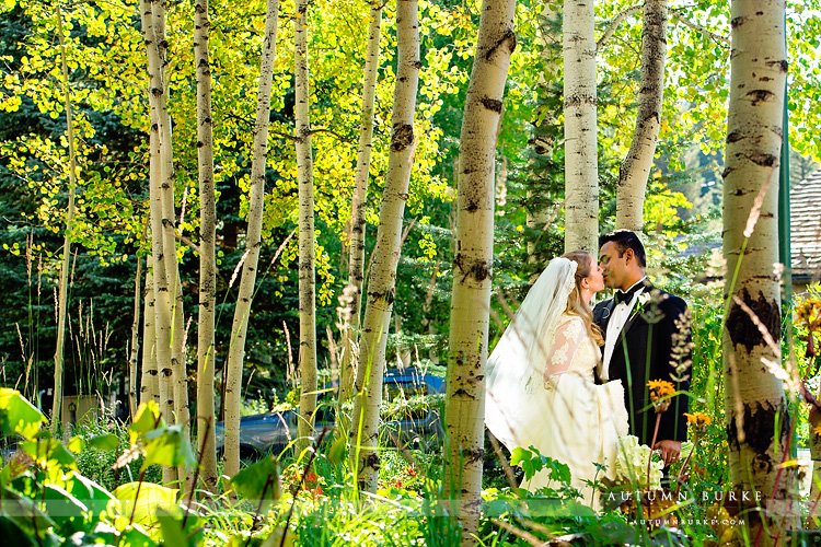 four seasons vail wedding bride and groom portrait aspen trees vail chapel