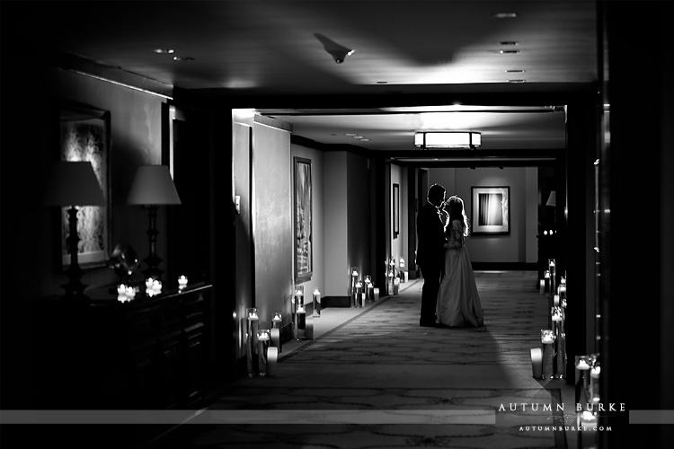 four seasons vail wedding candle lit hallway dramatic black and white bride and groom portrait