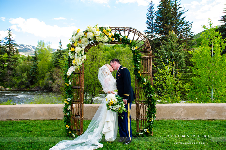 beaver creek westin riverfront wedding ceremony flower arch colorado mountain wedding