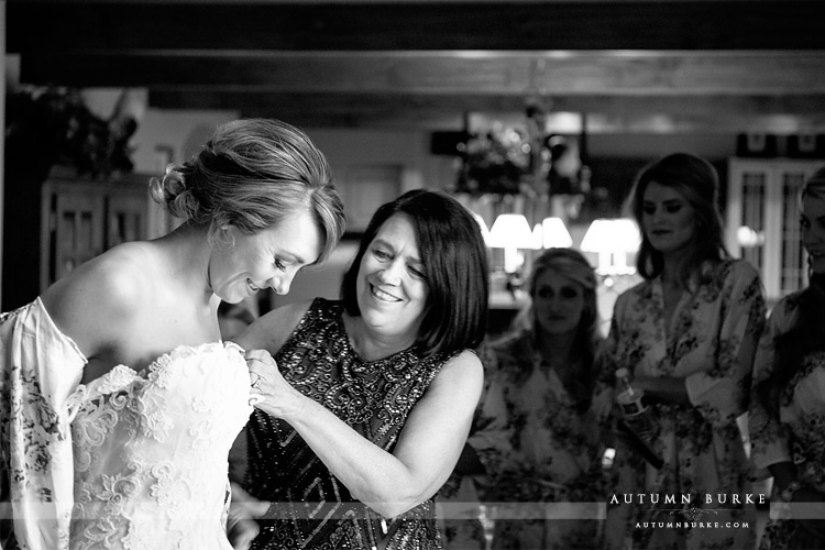 bride getting ready with mom spruce mtn ranch wedding