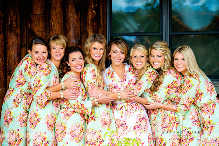 spruce mountain ranch bride with bridesmaids custom floral robes getting ready colorado wedding