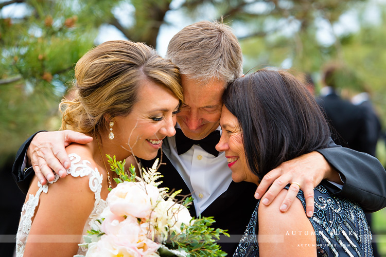 spruce mountain ranch bride with mom and dad family love colorado wedding